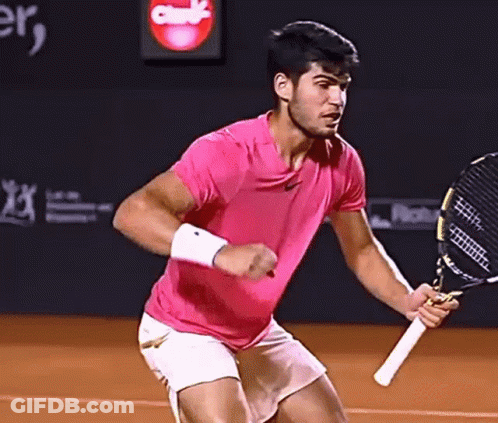 Man In Pink Shirt Holding Tennis Racket GIF
