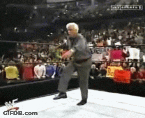 Man In Pink Shirt In Boxing Ring GIF