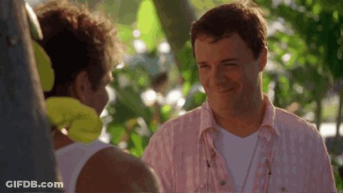 Man In Pink Shirt Laughing With Another Man GIF