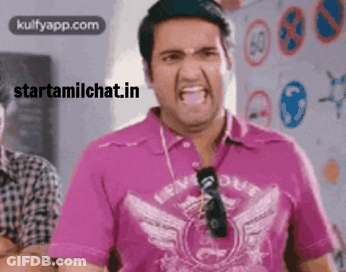 Man In Pink Shirt Making Funny Face Starttamilchat.in GIF
