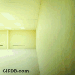 Man In Pink Shirt Running In Room GIF