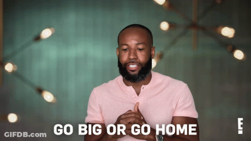 Man In Pink Shirt Saying Go Big Or Go Home GIF