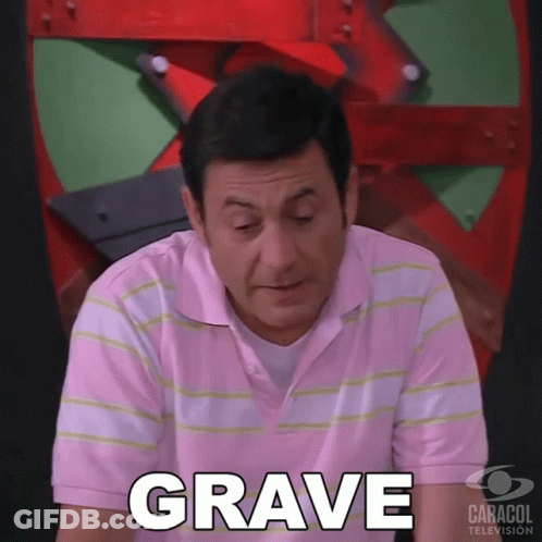 Man In Pink Shirt Saying Grave By Caracol TV Sign GIF