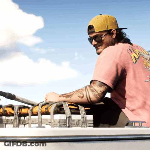 Man In Pink Shirt Saying NZ Sits On Boat GIF