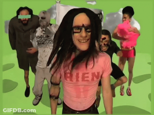 Man In Pink Shirt Saying Rien Surrounded By People GIF