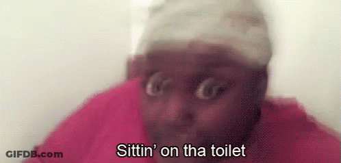 Man In Pink Shirt Saying Sittin' On The Toilet GIF