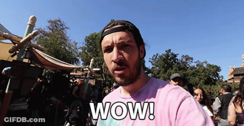 Man In Pink Shirt Says Wow GIF