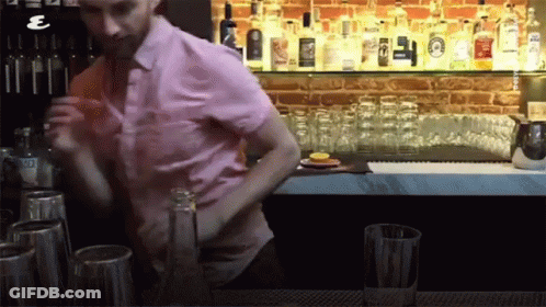 Man In Pink Shirt Shaking Glasses GIF