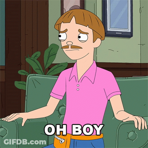 Man In Pink Shirt Sitting On Green Couch GIF