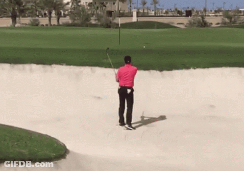 Man In Pink Shirt Swinging Golf Club GIF