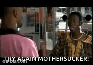 Man In Pink Shirt Talking To Another Man In Store GIF