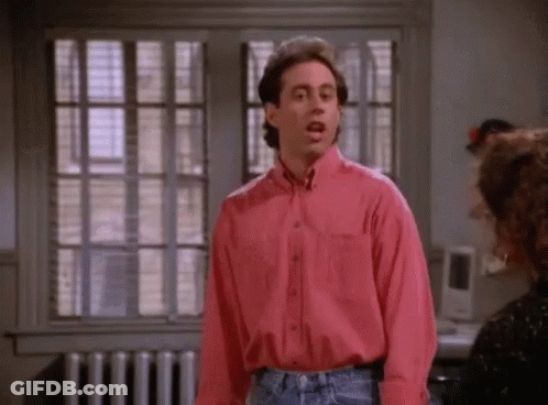 Man In Pink Shirt Talking To Woman GIF