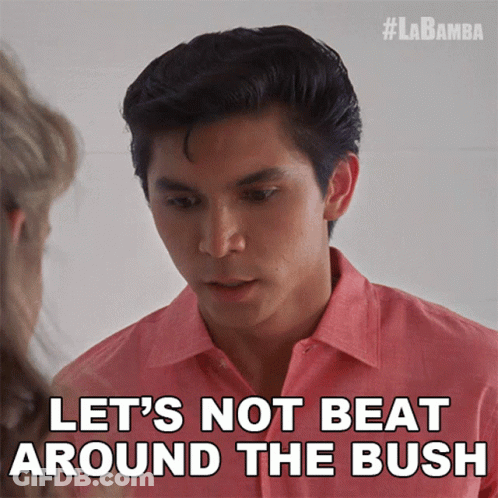 Man In Pink Shirt Telling Woman Let's Not Beat Around The Bush GIF