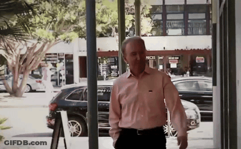 Man In Pink Shirt Walking GIF