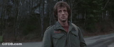 Man In Pink Shirt Waving GIF