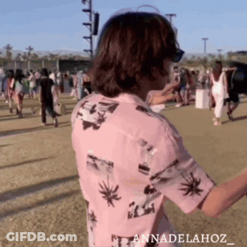 Man In Pink Shirt With Palm Trees GIF