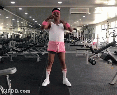 Man In Pink Shorts And White Adidas Socks In Gym GIF