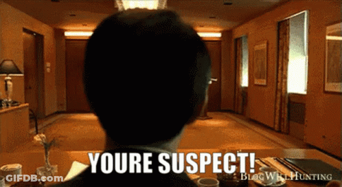 Man In Pink Suit Kneeling On Stage In Front Of Crowd GIF