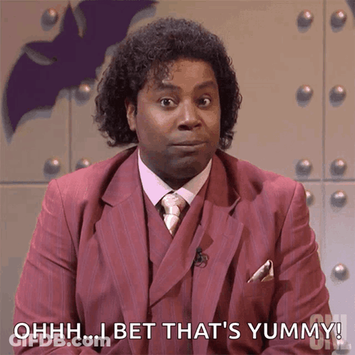 Man In Pink Suit Saying Ohhh Yummy GIF