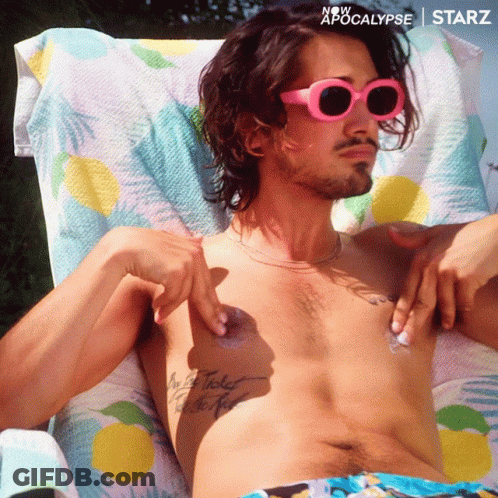 Man In Pink Sunglasses Lying On Towel GIF