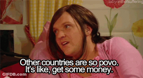 Man In Pink Sweater Says Other Countries Are So Povo GIF