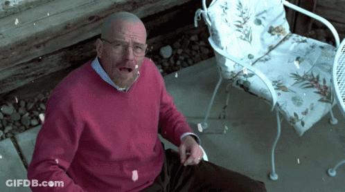 Man In Pink Sweater Sitting On Chair GIF