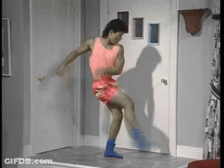 Man In Pink Tank Top Dancing GIF