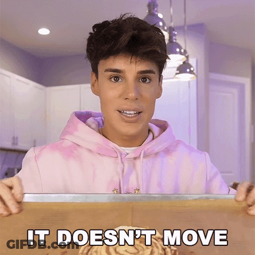 Man In Pink Tie Dye Hoodie Holding Tray Says It Doesn't Move GIF