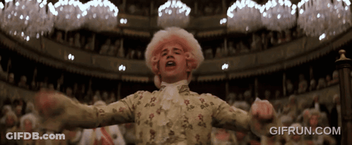 Man In Pink Wig Standing In Front Of Crowd GIF