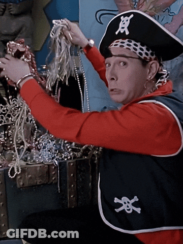 Man In Pirate Costume Holding Treasure Chest GIF