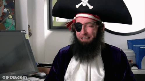 Man In Pirate Costume Sitting At Computer GIF