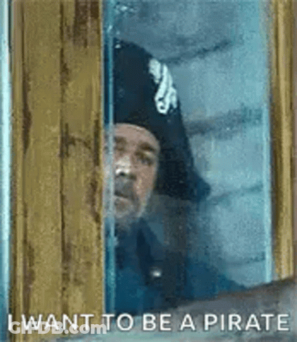Man In Pirate Hat Looking Out Window GIF