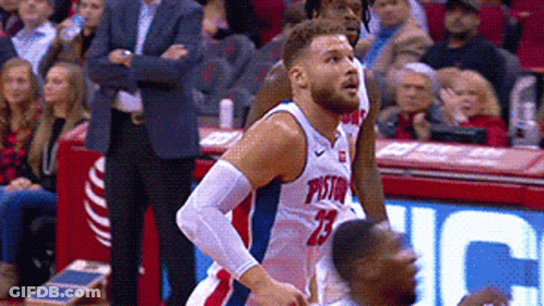 Man In Pistons Jersey Playing Basketball GIF
