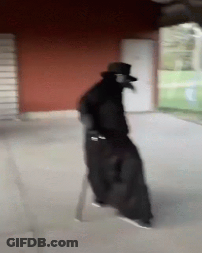 Man In Plague Doctor Costume Walking GIF