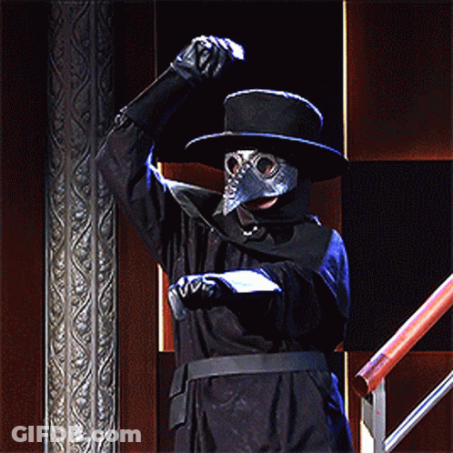 Man In Plague Doctor Costume With Top Hat GIF