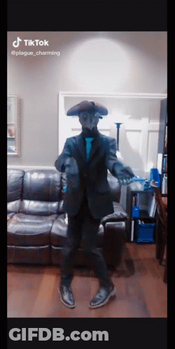 Man In Plague Mask Dancing In Living Room GIF