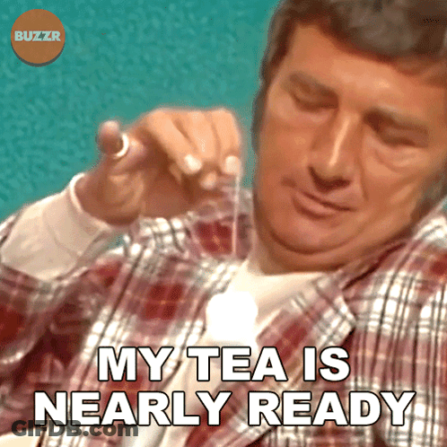 Man In Plaid Holding Tea Strainer My Tea Is Nearly Ready GIF