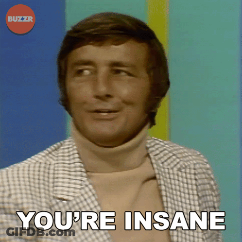 Man In Plaid Jacket And Turtleneck Says You're Insane GIF