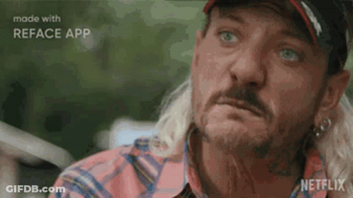 Man In Plaid Jacket And Yellow Sweater Pointing GIF