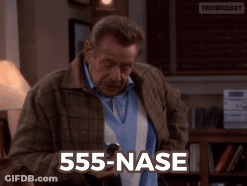 Man In Plaid Jacket Holding Cell Phone 555-Nase GIF