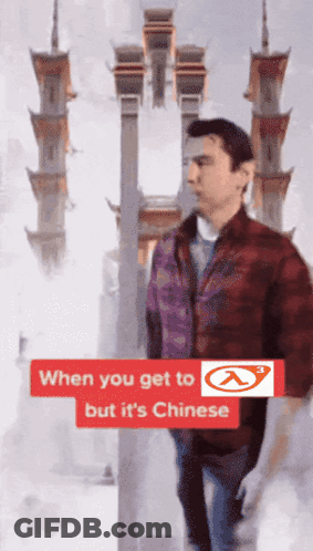Man In Plaid Jacket In Front Of Chinese Building GIF