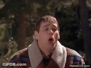 Man In Plaid Jacket Making Funny Face In Woods GIF