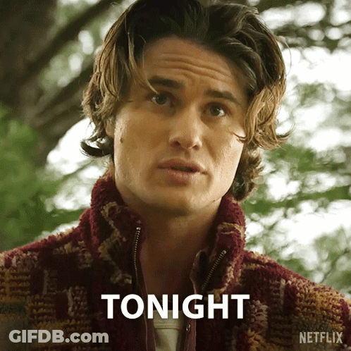 Man In Plaid Jacket Says Tonight In Front Of Tree GIF