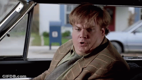 Man In Plaid Jacket Sitting In Car With Blue Mailbox GIF