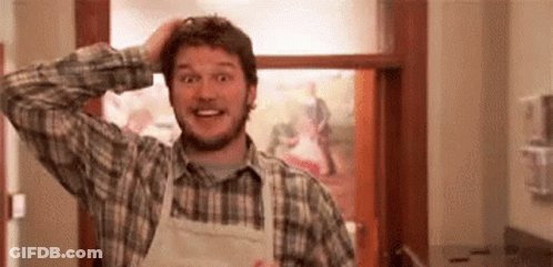 Man In Plaid Shirt And Apron Holding Head GIF