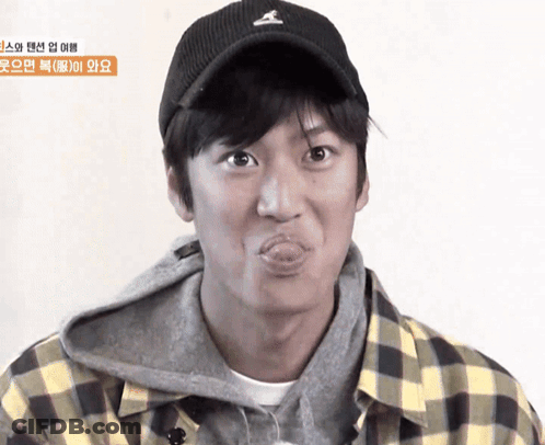 Man In Plaid Shirt And Baseball Cap With S GIF