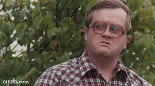 Man In Plaid Shirt And Glasses By Tree GIF