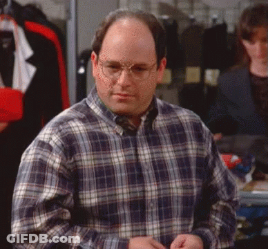 Man In Plaid Shirt And Glasses In Dressing Room GIF