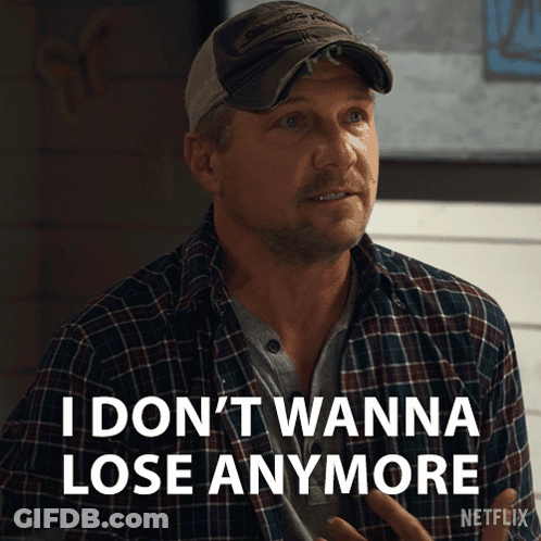 Man In Plaid Shirt And Hat Says I Don't Wanna Lose Anymore GIF