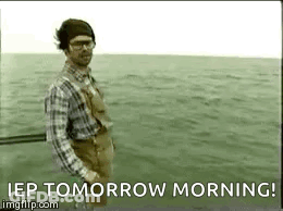 Man In Plaid Shirt And Overalls Fishing GIF